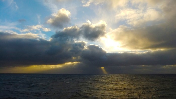 Beautiful sunset with a rough sea. North of the Azores Islands.